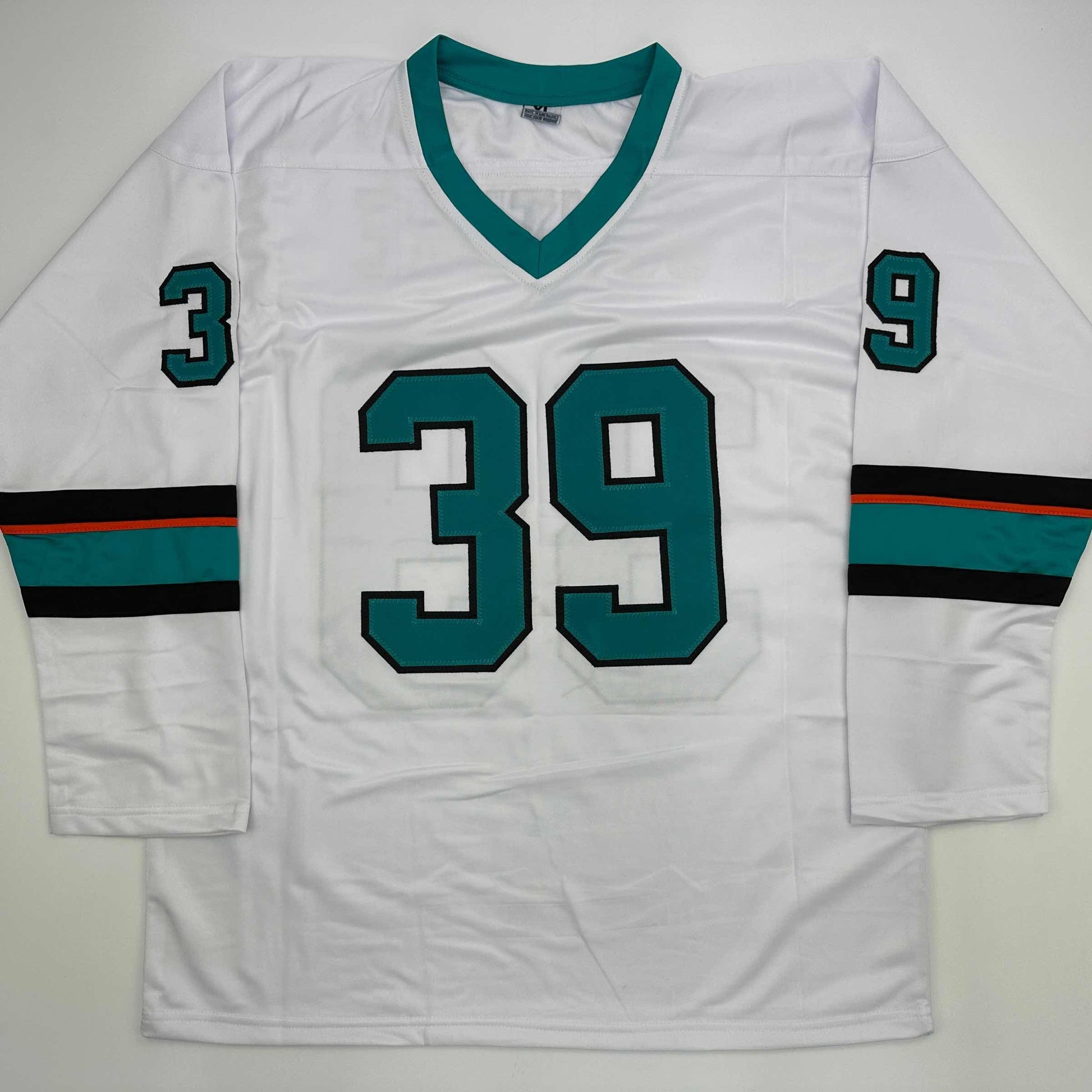 White hockey jersey with teal and black striping, displaying number 39 on chest and numbers 3 and 9 on sleeves, laid flat.