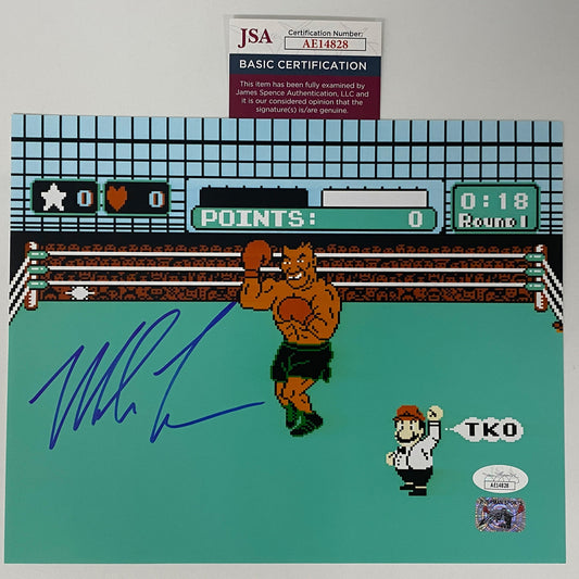 Signed Mike Tyson's Punch-Out game screenshot print on turquoise background with JSA authentication certificate displayed above.