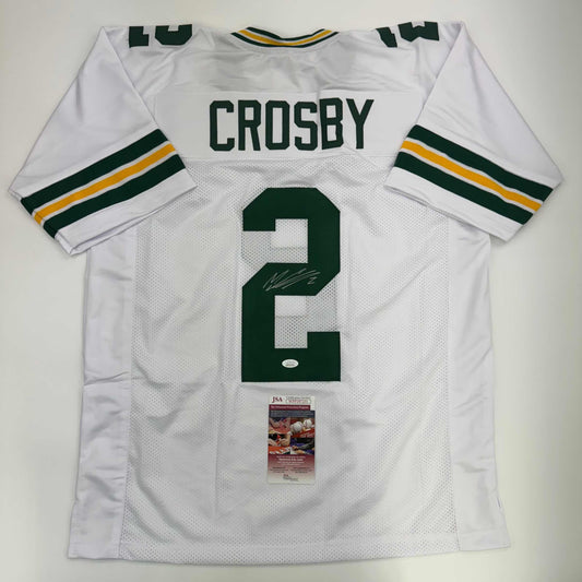 White Green Bay Packers jersey number 2 with "CROSBY" name, signed, displayed flat with JSA authentication certificate visible.