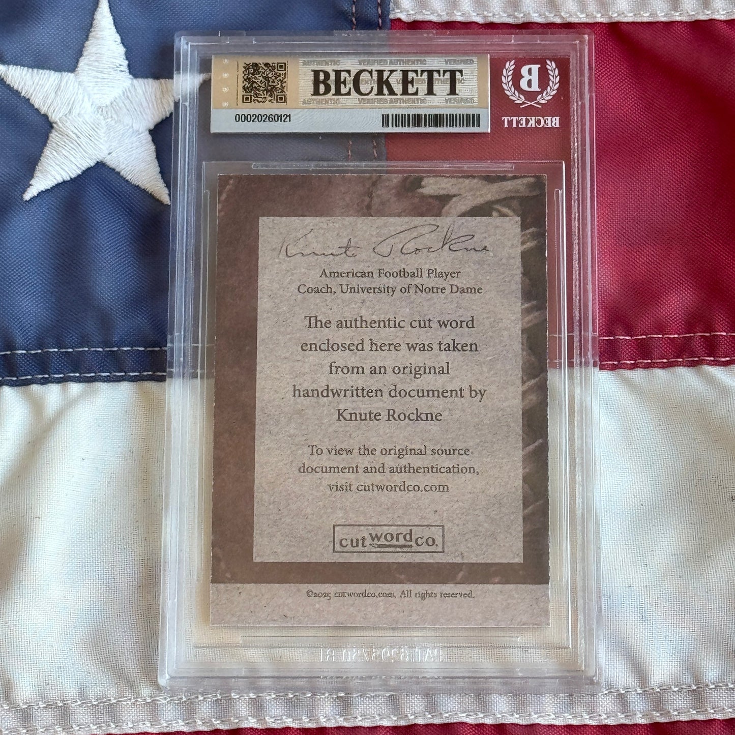 Knute Rockne Beckett Encapsulated Handwriting Removed from his Notre Dame Textbook Signed