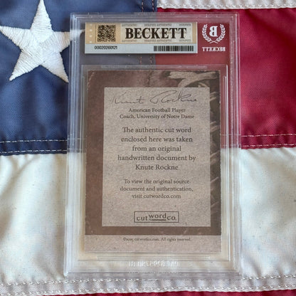 Knute Rockne Beckett Encapsulated Handwriting Removed from his Notre Dame Textbook Signed