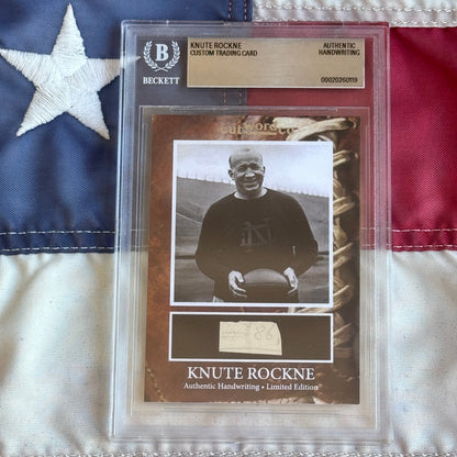 Knute Rockne Beckett Encapsulated Handwriting Removed from his Notre Dame Textbook Signed