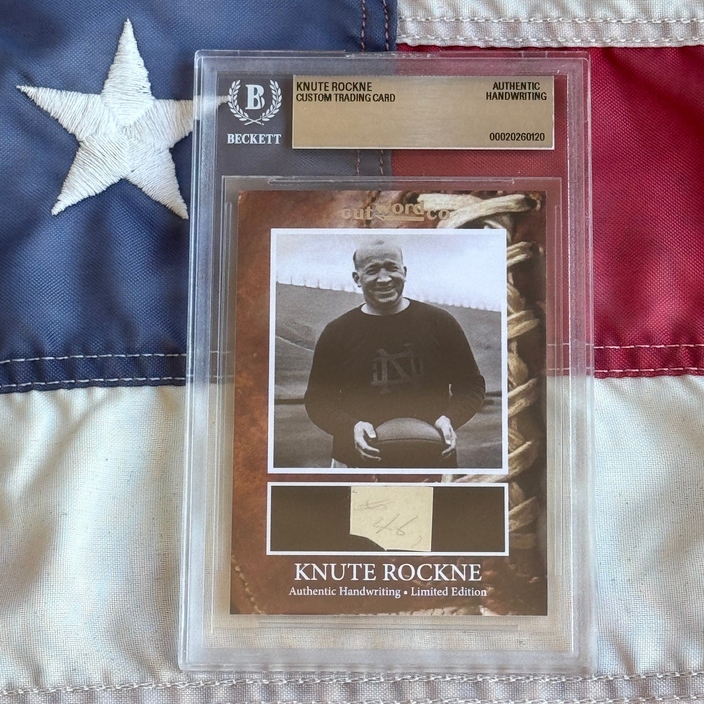 Knute Rockne Beckett Encapsulated Handwriting Removed from his Notre Dame Textbook Signed