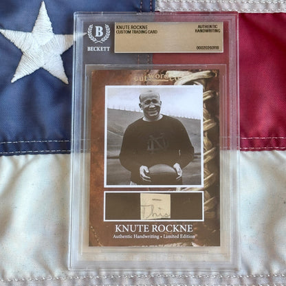 Knute Rockne Beckett Encapsulated Handwriting Removed from his Notre Dame Textbook Signed
