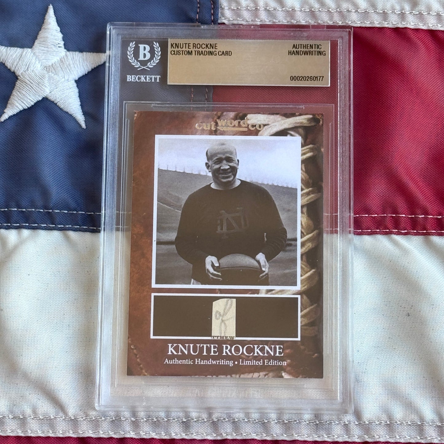 Knute Rockne Beckett Encapsulated Handwriting Removed from his Notre Dame Textbook Signed