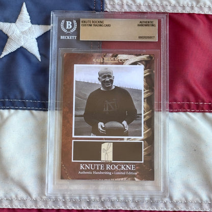 Knute Rockne Beckett Encapsulated Handwriting Removed from his Notre Dame Textbook Signed