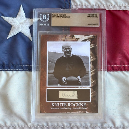 Knute Rockne Beckett Encapsulated Handwriting Removed from his Notre Dame Textbook Signed
