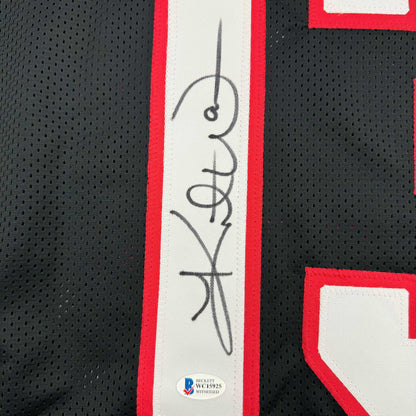 Framed Autographed Kurt Warner 35x39 Arizona Black Football Jersey Beckett BAS COA