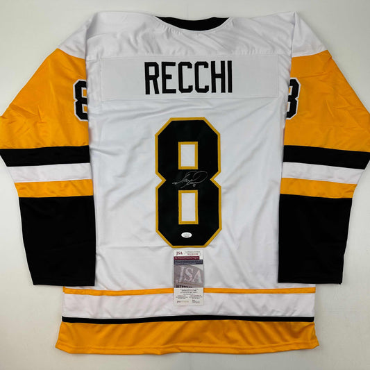 White Boston Bruins hockey jersey number 8 with "RECCHI" nameplate, signed, displayed flat with JSA authentication certificate visible.