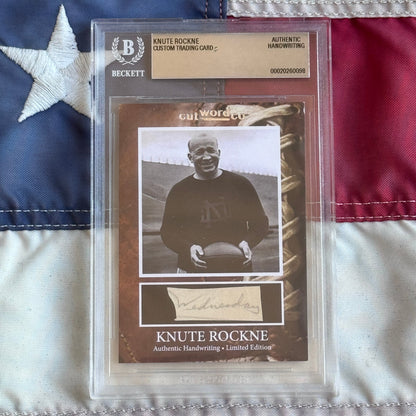 Knute Rockne Beckett Encapsulated Handwriting Removed from his Notre Dame Textbook Signed