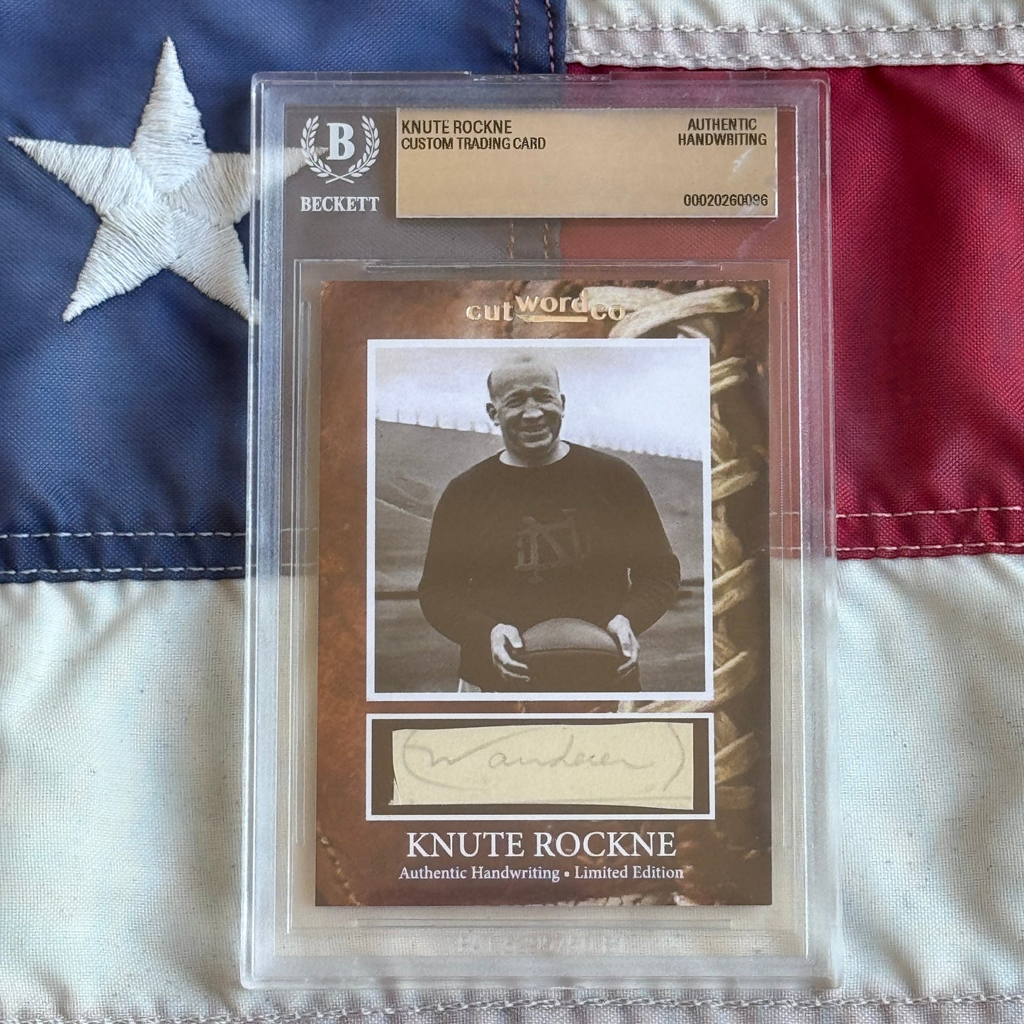 Knute Rockne Beckett Encapsulated Handwriting Removed from his Notre Dame Textbook Signed