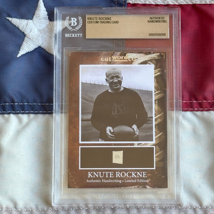 Knute Rockne Beckett Encapsulated Handwriting Removed from his Notre Dame Textbook Signed