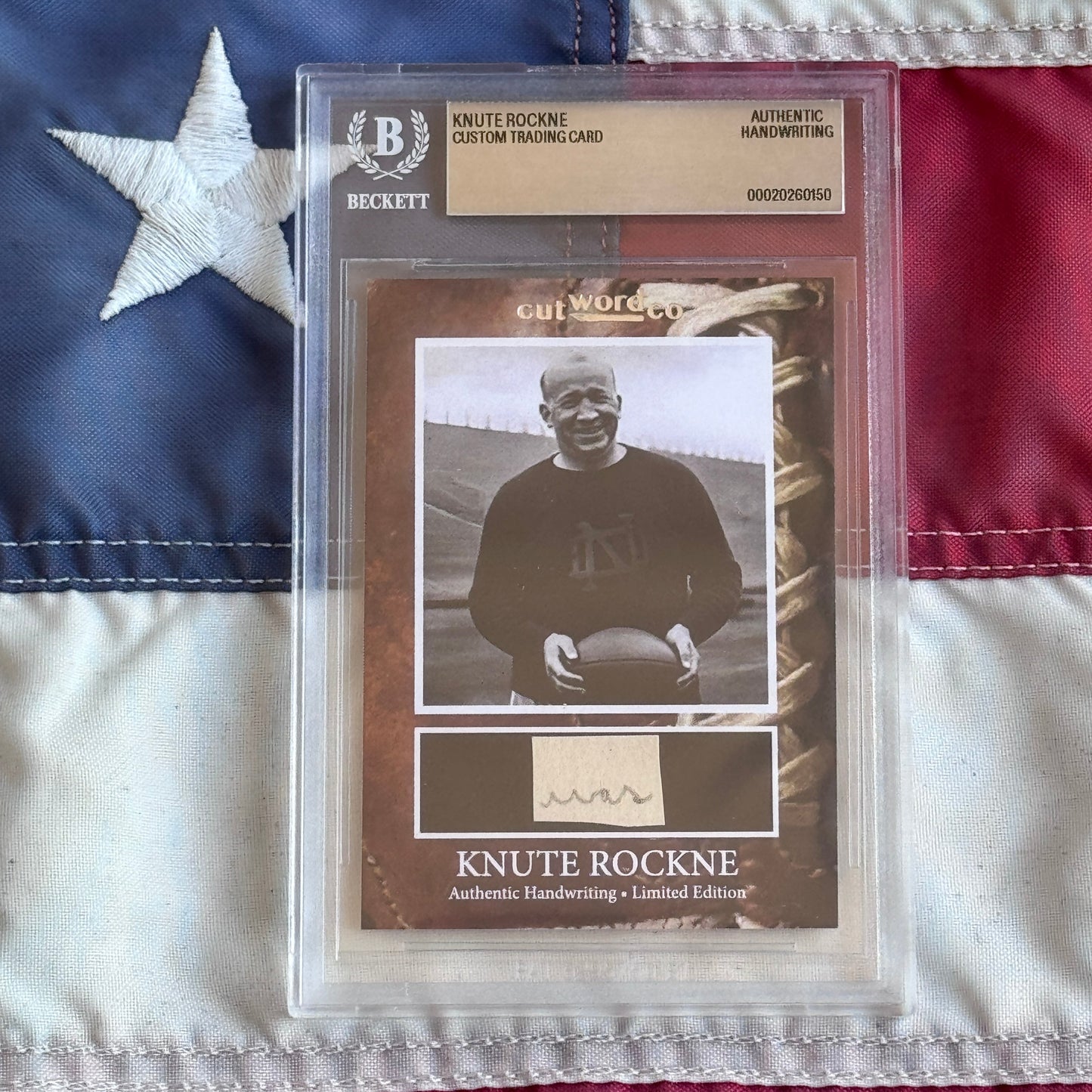 Knute Rockne Beckett Encapsulated Handwriting Removed from his Notre Dame Textbook Signed