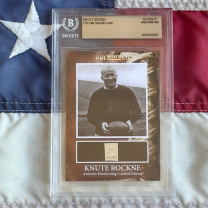 Knute Rockne Beckett Encapsulated Handwriting Removed from his Notre Dame Textbook Signed