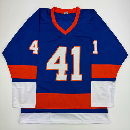 Blue and red hockey jersey with white number 41 and orange trim, displayed flat against white background.