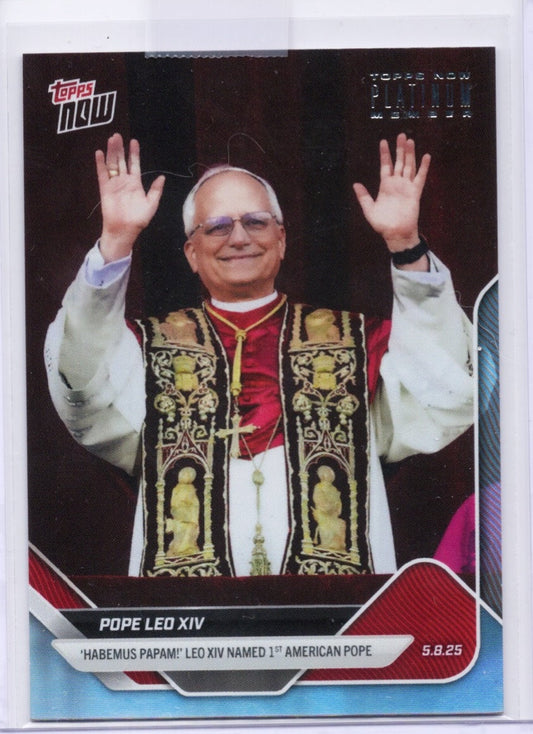 Pope Leo XIV wearing glasses and ornate ceremonial vestments with hands raised in blessing, against dark background on trading card.