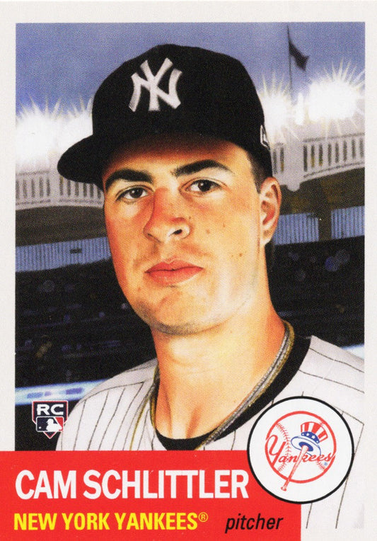 Portrait of Cam Schlittler wearing New York Yankees pinstriped uniform and black cap with NY logo, stadium background visible.