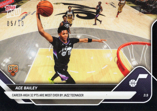 Ace Bailey basketball card showing overhead court view of player in black Jazz uniform shooting with arm extended, purple and black foil design visible.