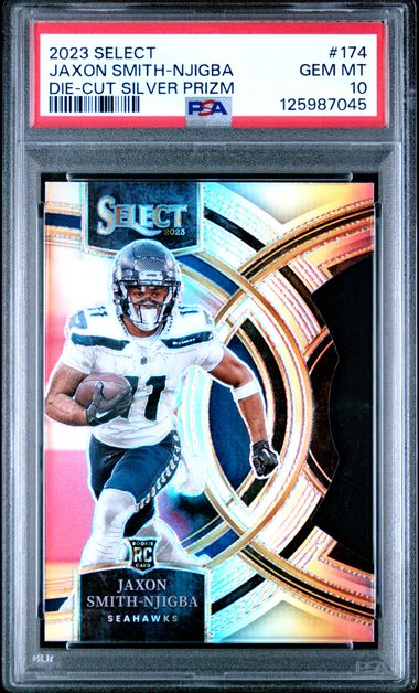 PSA-graded card front showing Jaxon Smith-Njigba in Seahawks uniform with holographic silver prizm finish and die-cut design.