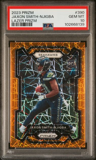 PSA-graded 2023 Prizm card in clear case showing Jaxon Smith-Njigba in Seahawks uniform with orange and black laser-etched design border.
