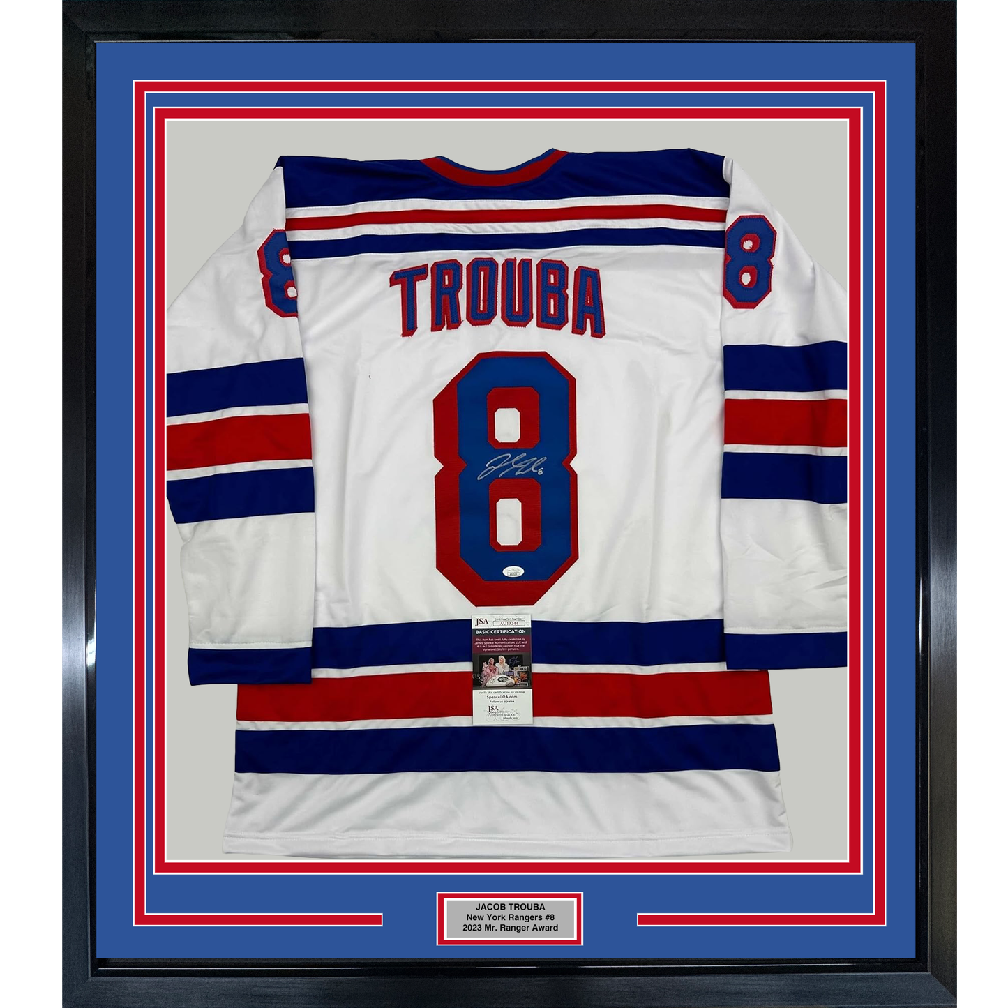 Framed white New York Rangers hockey jersey number 8 with "TROUBA" nameplate and signature, displayed against blue and red striped matting with JSA authentication certificate visible.