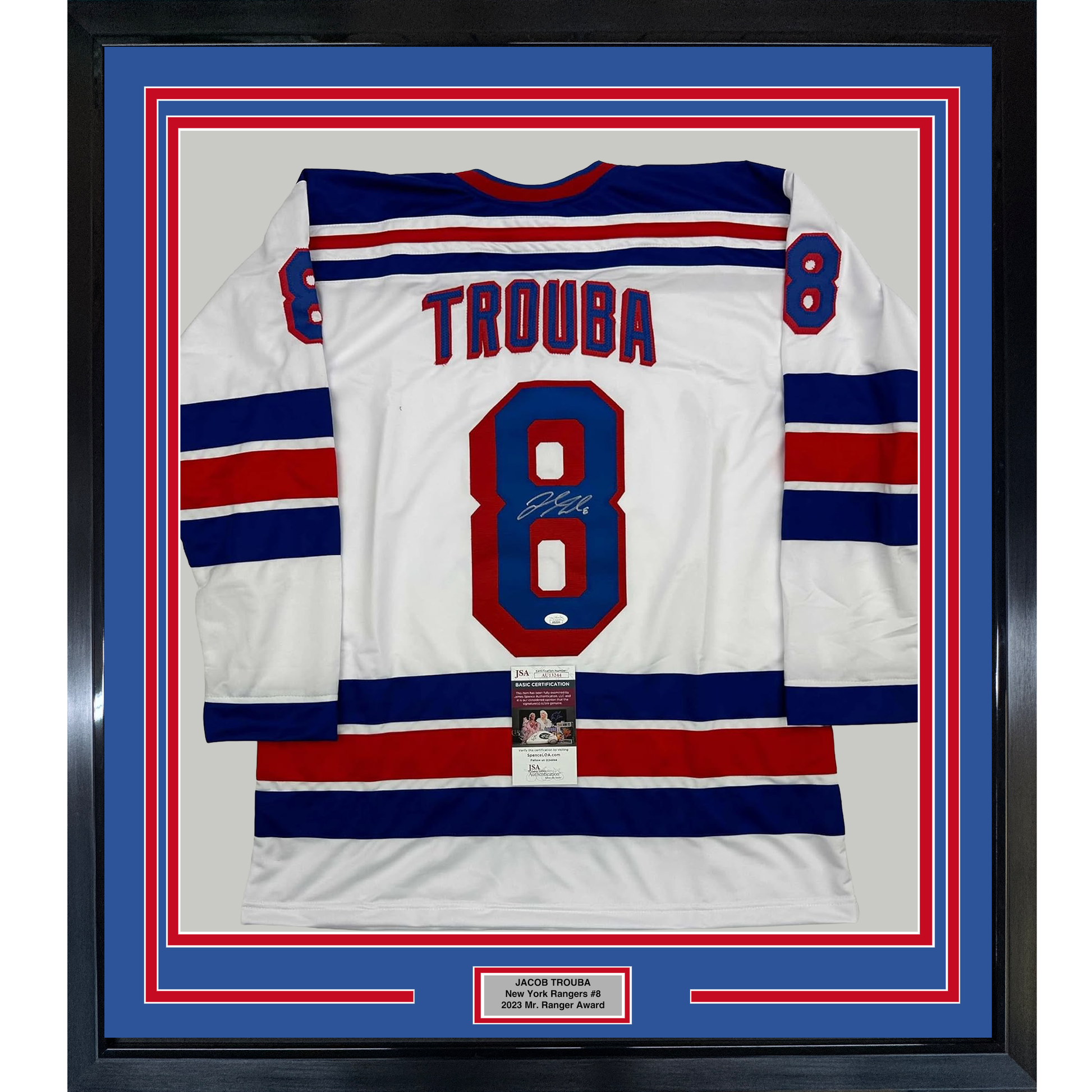 Framed white New York Rangers hockey jersey number 8 with "TROUBA" nameplate and signature, displayed against blue and red striped matting with JSA authentication certificate visible.