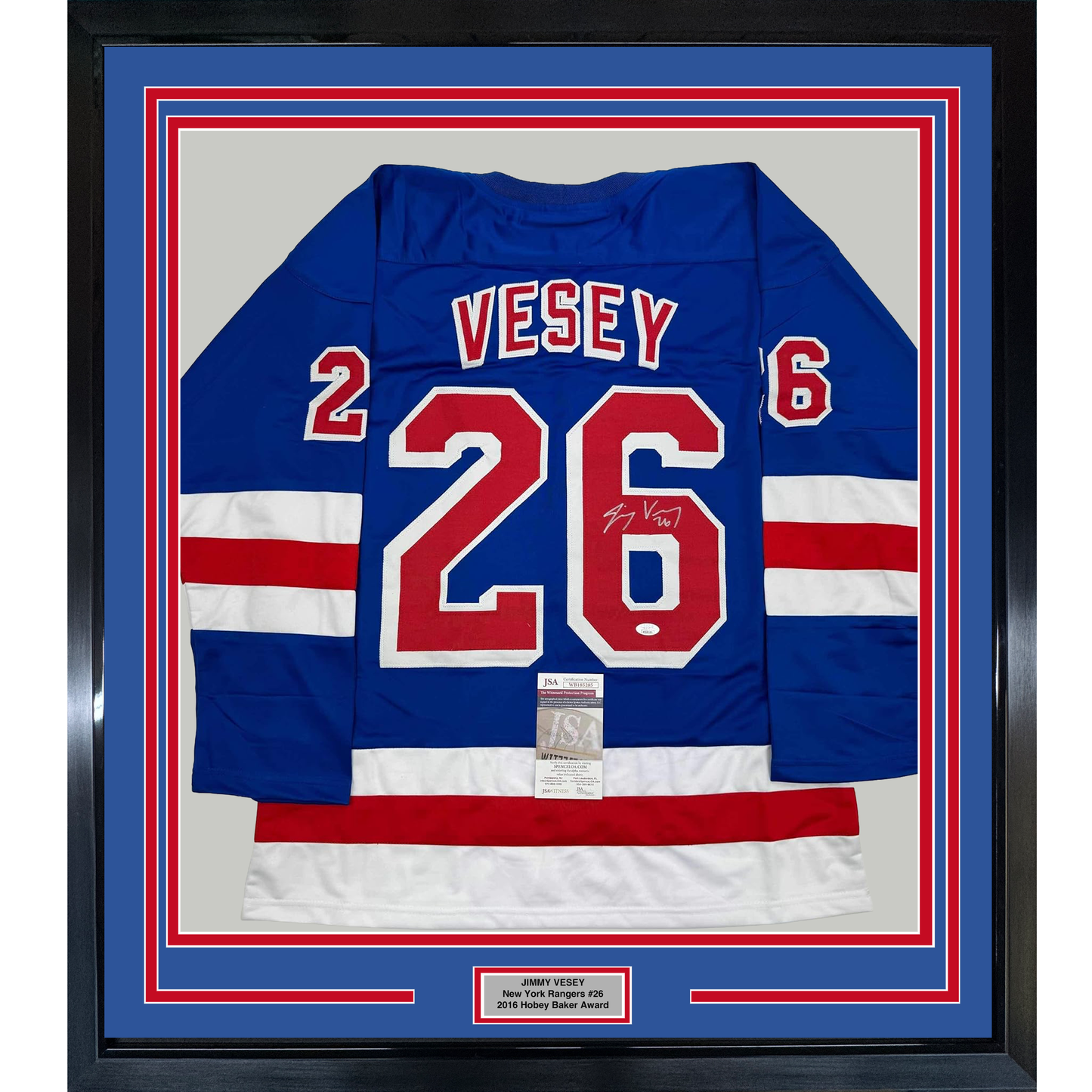 Blue New York Rangers hockey jersey #26 with "VESEY" nameplate and signature, framed with red and white borders and JSA authentication certificate.