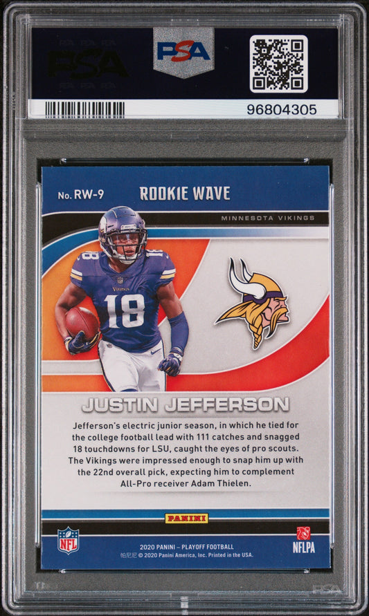 Back of a slabbed card showing a player in purple number 18 Vikings jersey holding a football beside a helmet logo.