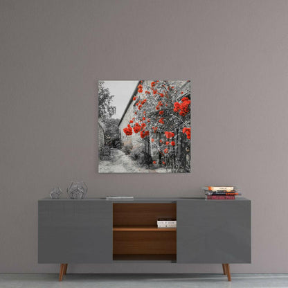 Red Roses Glass Wall Art hanging above gray mid-century modern sideboard with wooden shelving and decorative items.