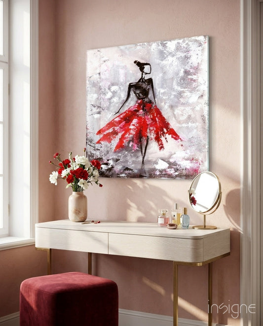 Red Skirt Dancer frosted glass wall art displayed above a light wood vanity with flowers and cosmetics.