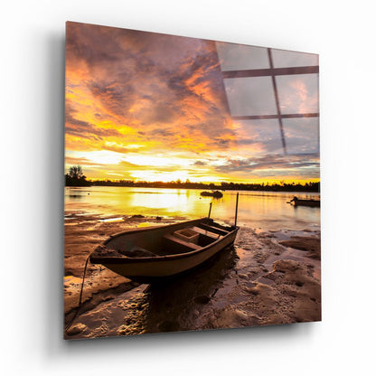 Wooden Rowboat Fiery Lake Sunset Glass Wall Art