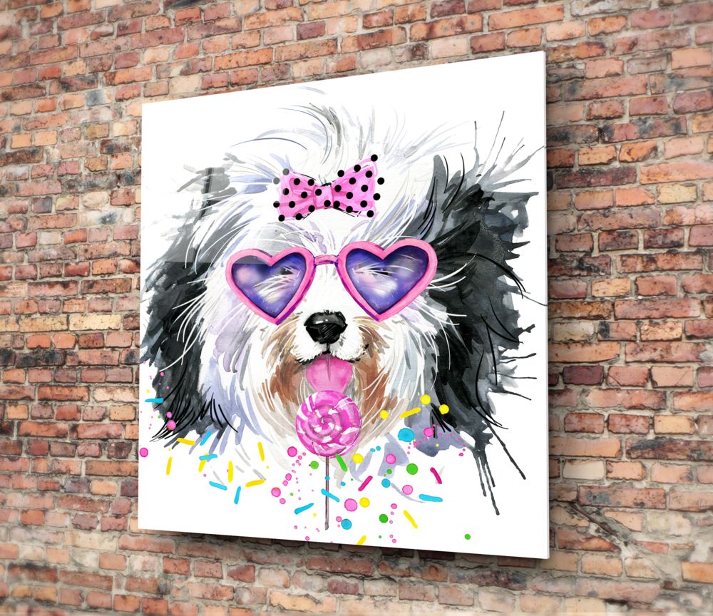 Colorful glass wall art of a fluffy dog wearing pink heart sunglasses and holding a pink flower, mounted on red brick wall.