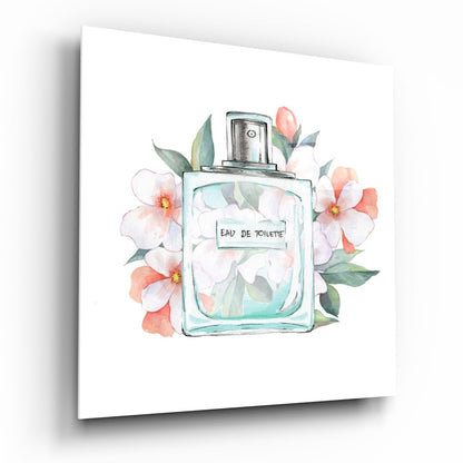 Square canvas wall art featuring a watercolor illustration of a rectangular perfume bottle labeled "Eau De Toilette" surrounded by pink and coral flowers with green leaves on white background.
