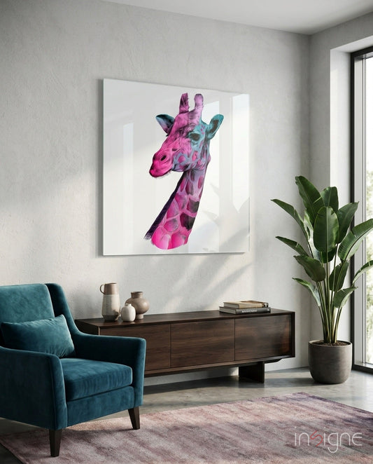Pink and teal giraffe head profile artwork displayed on white wall above dark wood credenza in modern living room.