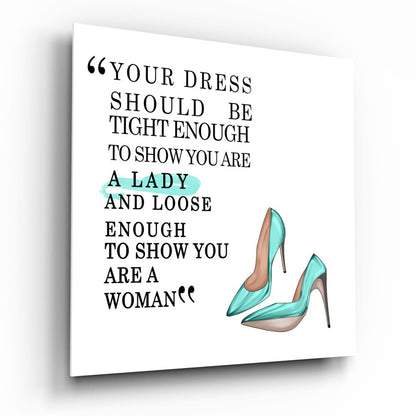 Canvas wall art with black serif text quote and turquoise high-heeled shoes illustration on white background.