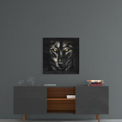 Square glass wall art featuring a wolf's face with piercing yellow eyes against black background, displayed above a mid-century modern credenza.