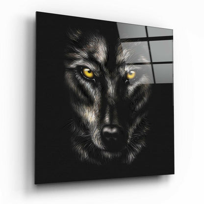 Black glass wall art displaying a close-up wolf face with striking yellow eyes against dark background, mounted at an angle.