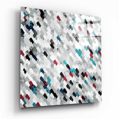 Square glass wall art panel with diagonal geometric pattern of gray, white, black, teal, and burgundy tiles with textured overlay.