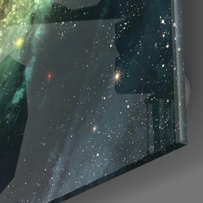 Space Yellow Infinity Glass Wall Art displayed at an angle showing a starfield with nebula clouds and bright stars against dark space background.