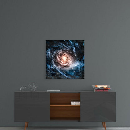Square glass wall art depicting a spiral galaxy with glowing pink core and blue-tinted spiral arms, displayed above a mid-century modern credenza.