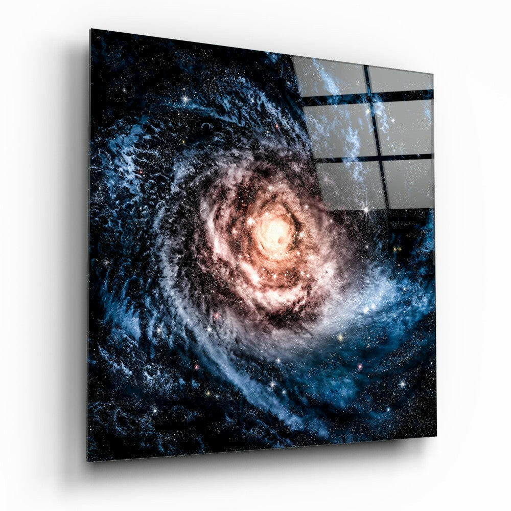 Angled view of a square glass wall panel displaying a spiral galaxy with blue and pink nebula clouds against a starfield, with visible grid lines on the upper right portion.