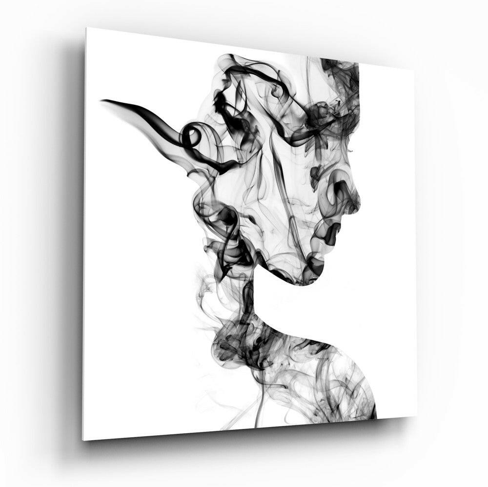 Profile silhouette of a woman's head and shoulders formed by flowing black smoke wisps against white background.