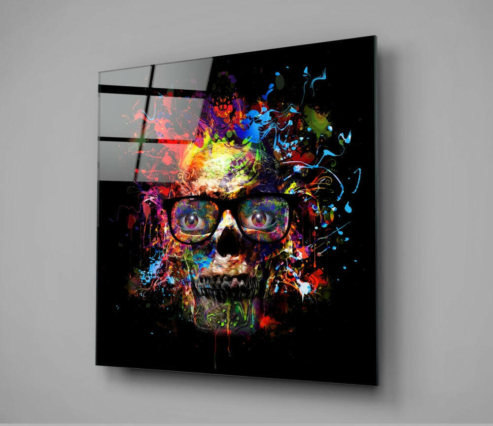 Colorful skull glass wall art mounted at an angle, displaying vibrant neon paint splatters and musical notes on black background with horizontal black bars overlay.