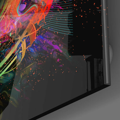 Angled side view of glass wall art displaying vibrant neon abstract design with orange, pink, cyan, and purple flowing patterns and particles.