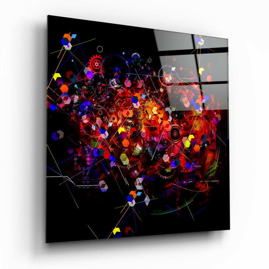 Angled perspective of glass wall art displaying vibrant red, blue, and yellow geometric shapes with interconnected gears and lines on black background.