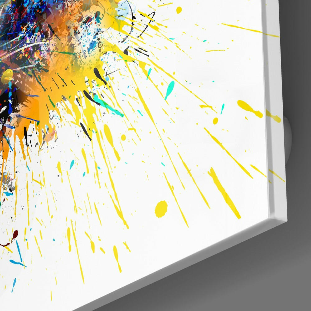 Abstract colorful paint splatter canvas with yellow streaks radiating from vibrant blue, orange, and red concentrated on left edge.