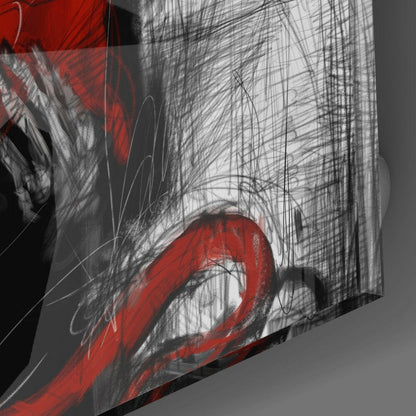 Close-up angled view of glass wall art showing red curved brushstrokes and black line drawings on translucent surface.