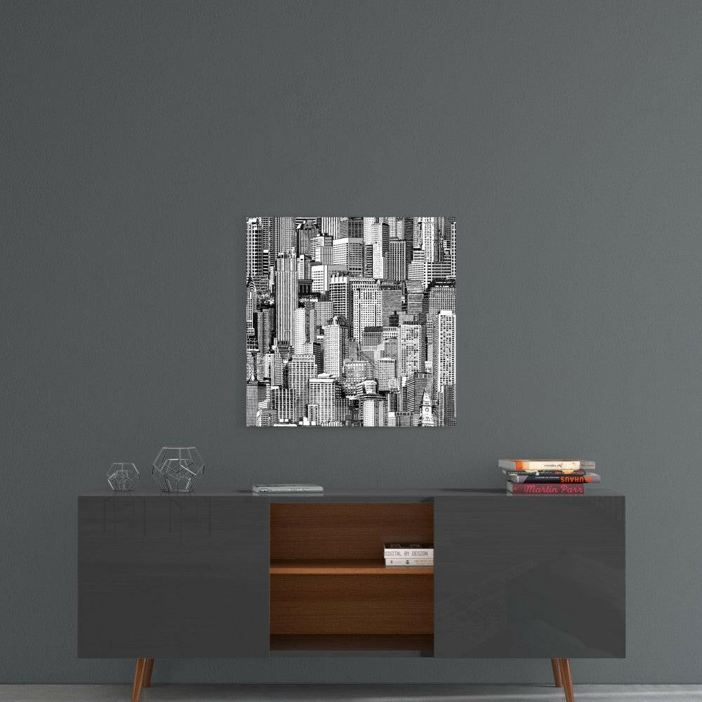 Black and white cityscape glass wall art displayed above mid-century modern console table against gray wall.
