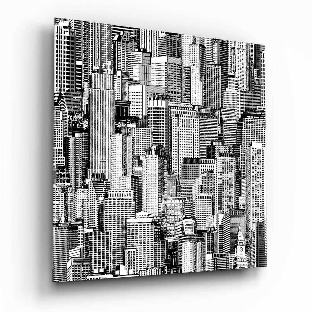 Black and white illustration of densely packed skyscrapers printed on glass panel, displayed at three-quarter angle showing depth and shadow.