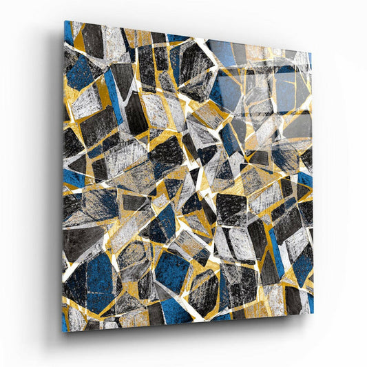 Abstract glass wall art featuring geometric hexagonal shapes in blue, black, white, and gold with textured surfaces, angled perspective view.